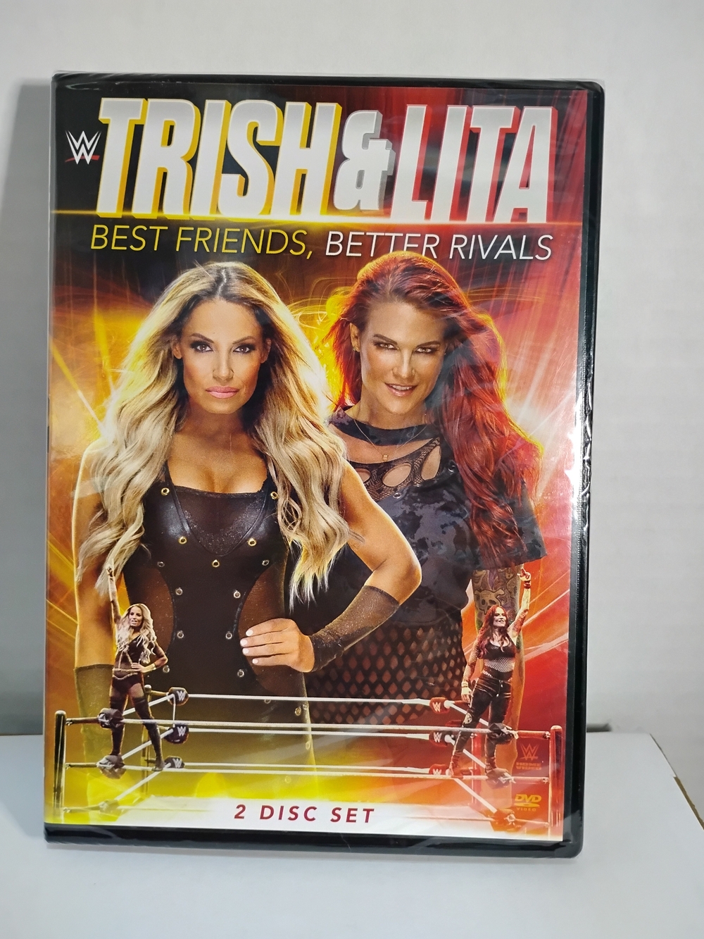 WWE Trish & Lita DVD - Yellow, Red and Black Cover